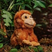 orangutan cuddly toy with background