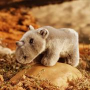 rhino cuddly toy with background