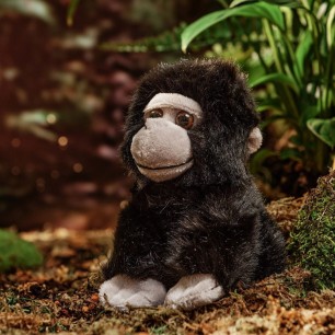 gorilla cuddly toy in the forest