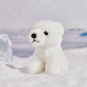 polar bear cuddly toy on snow