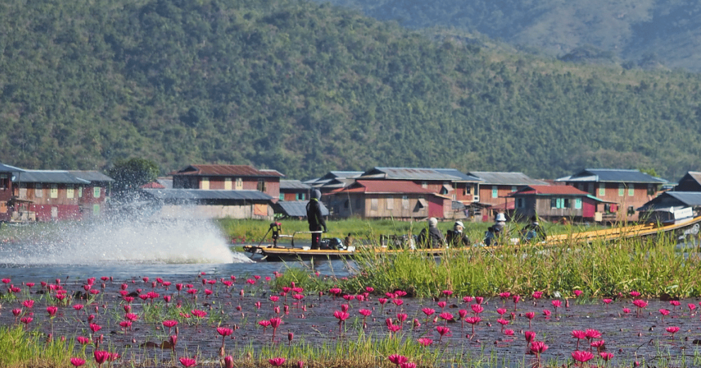A group of people on a boat, travelling through the river that leads to Inle Lake, Myanmar