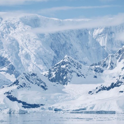 cold and icy Antarctic landscape with blue sky